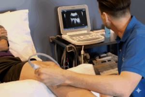 A Physical Therapist uses diagnostic ultrasound to assess a patient's medical knee pain looking for a meniscus injury